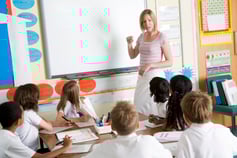 a-teacher-teaching-a-junior-school-class_BYeezSCRHi
